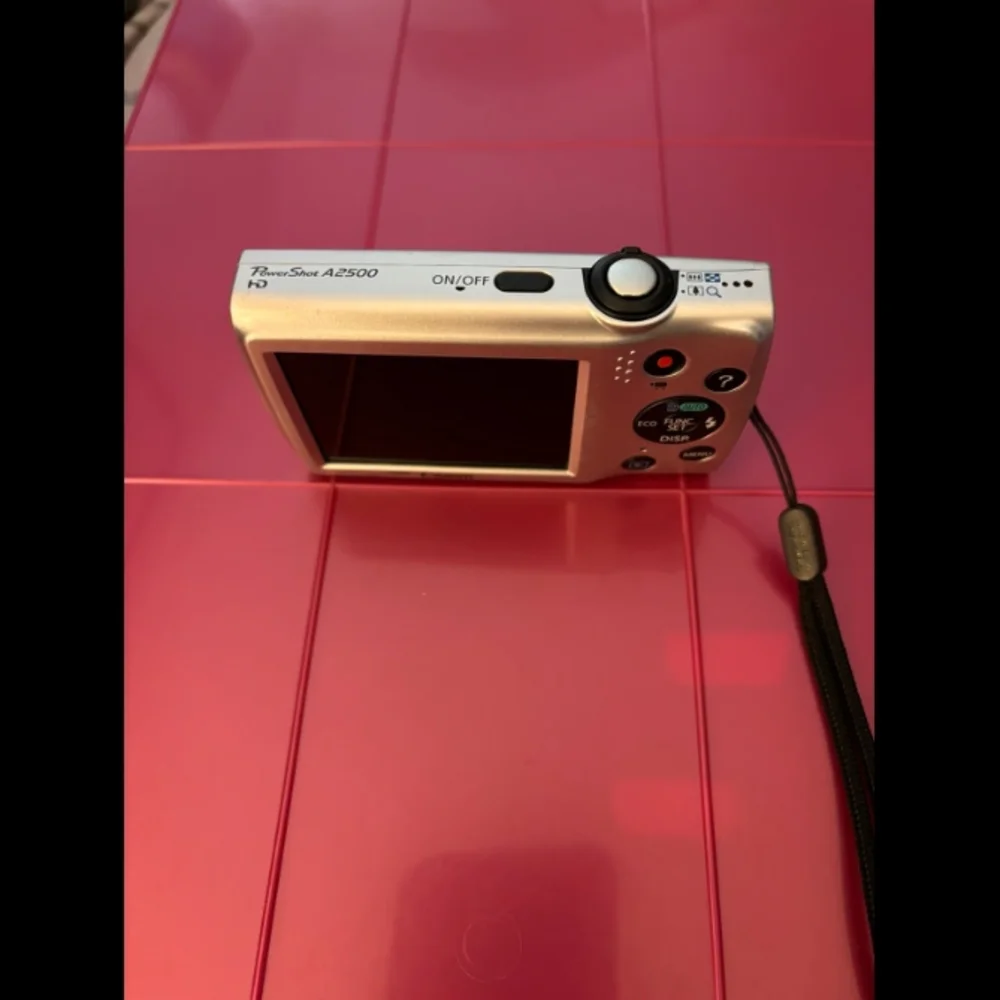 Canon Silver Digital Camera with Black Case